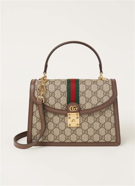 Kleine dames tassen van Gucci .